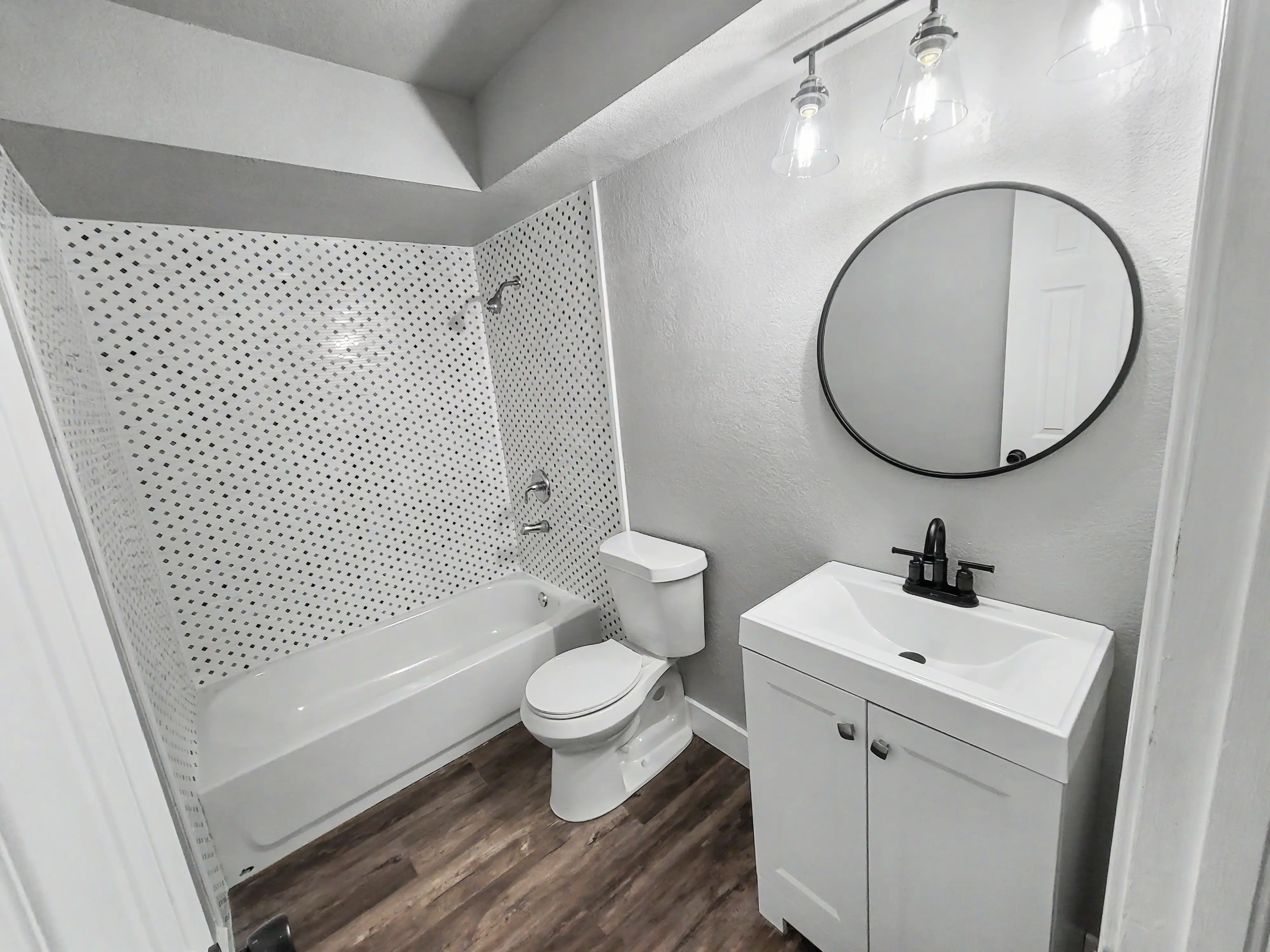 After bathroom detail view showing clean install and coordinated finishes in Tulsa home