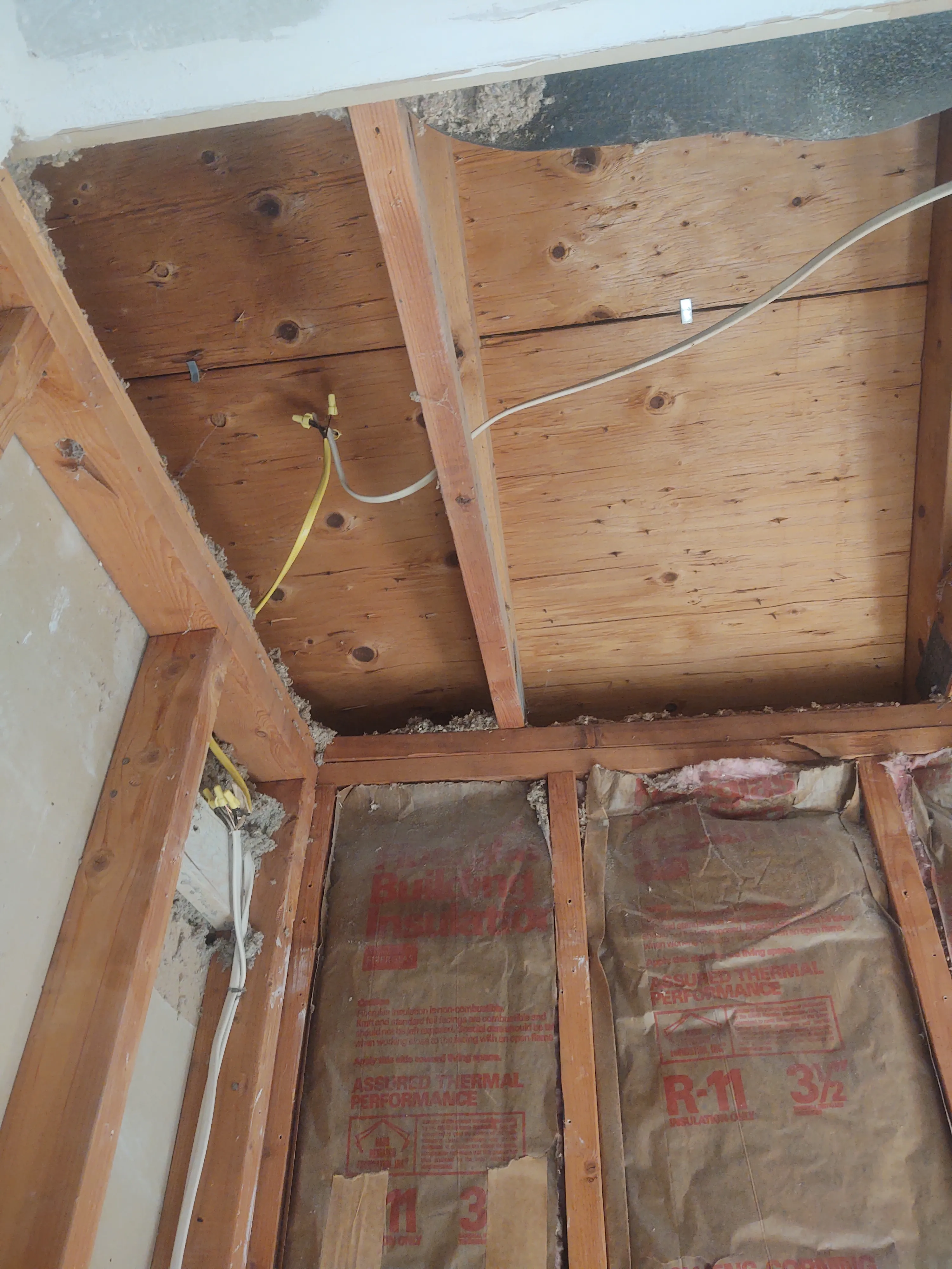 Jon working during the shower remodel process before final finishes in Tulsa